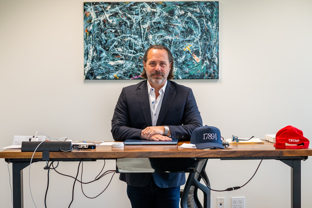 Rockbridge Network co-founder Chris Buskirk poses for a portrait at his offices in Scottsdale, Arizona.