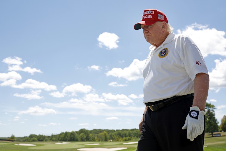 Former U.S. President Donald Trump walks the driving range during day two of the LIV Golf Invitational at his Bedminster, NJ resort.