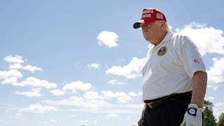 Former U.S. President Donald Trump walks the driving range during day two of the LIV Golf Invitational at his Bedminster, NJ resort.