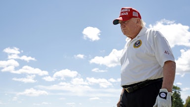 Former U.S. President Donald Trump walks the driving range during day two of the LIV Golf Invitational at his Bedminster, NJ resort.