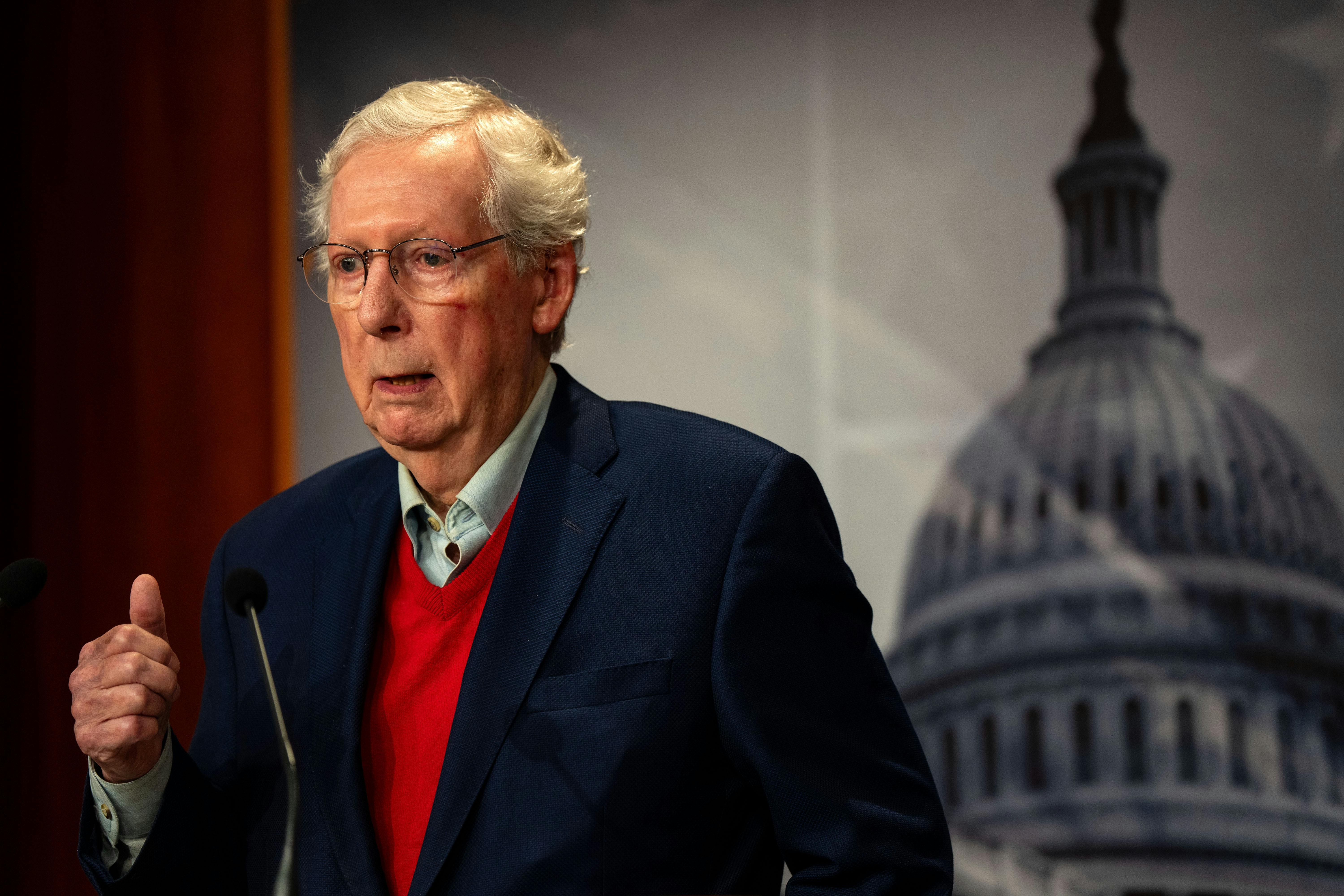 Senator Mitch McConnnell speaks (and seems to zone out) during a news conference at the Capitol.