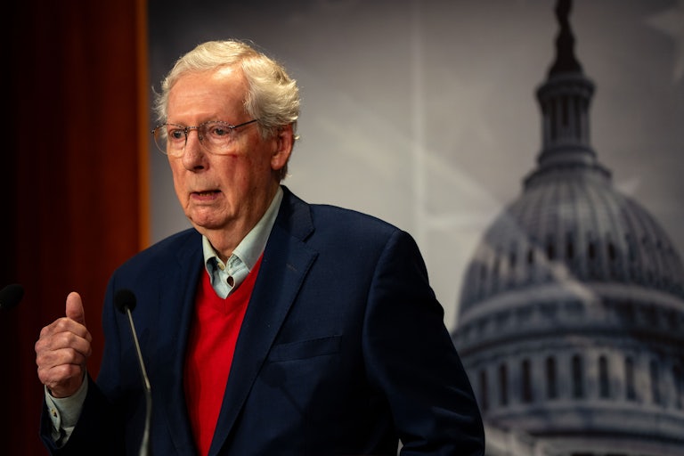Senator Mitch McConnnell speaks (and seems to zone out) during a news conference at the Capitol.