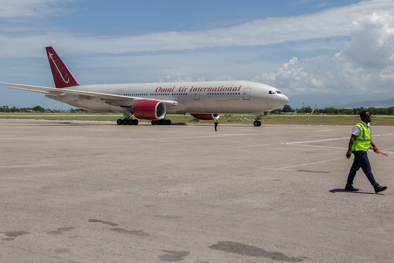 An Omni Air International plane at an airport in Port-au-Prince, Haiti