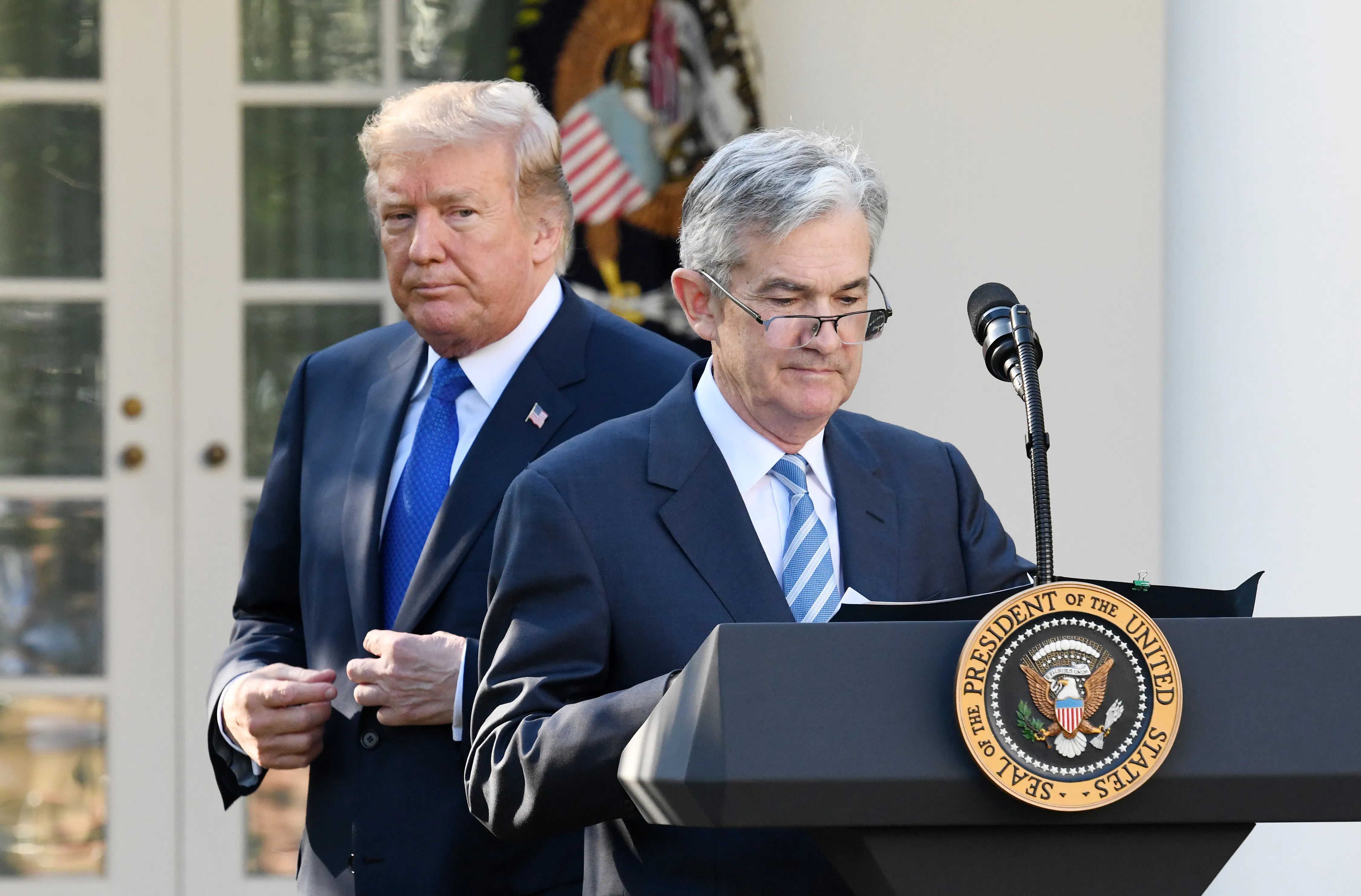 U.S. Federal Reserve Chairman Jerome Powell and President Donald Trump.