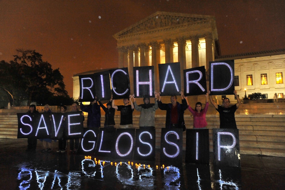 Anti-death penalty activists rally outside the U.S. Supreme Court on behalf of Oklahoma death row inmate Richard Glossip.