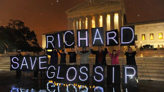 Anti-death penalty activists rally outside the U.S. Supreme Court on behalf of Oklahoma death row inmate Richard Glossip.