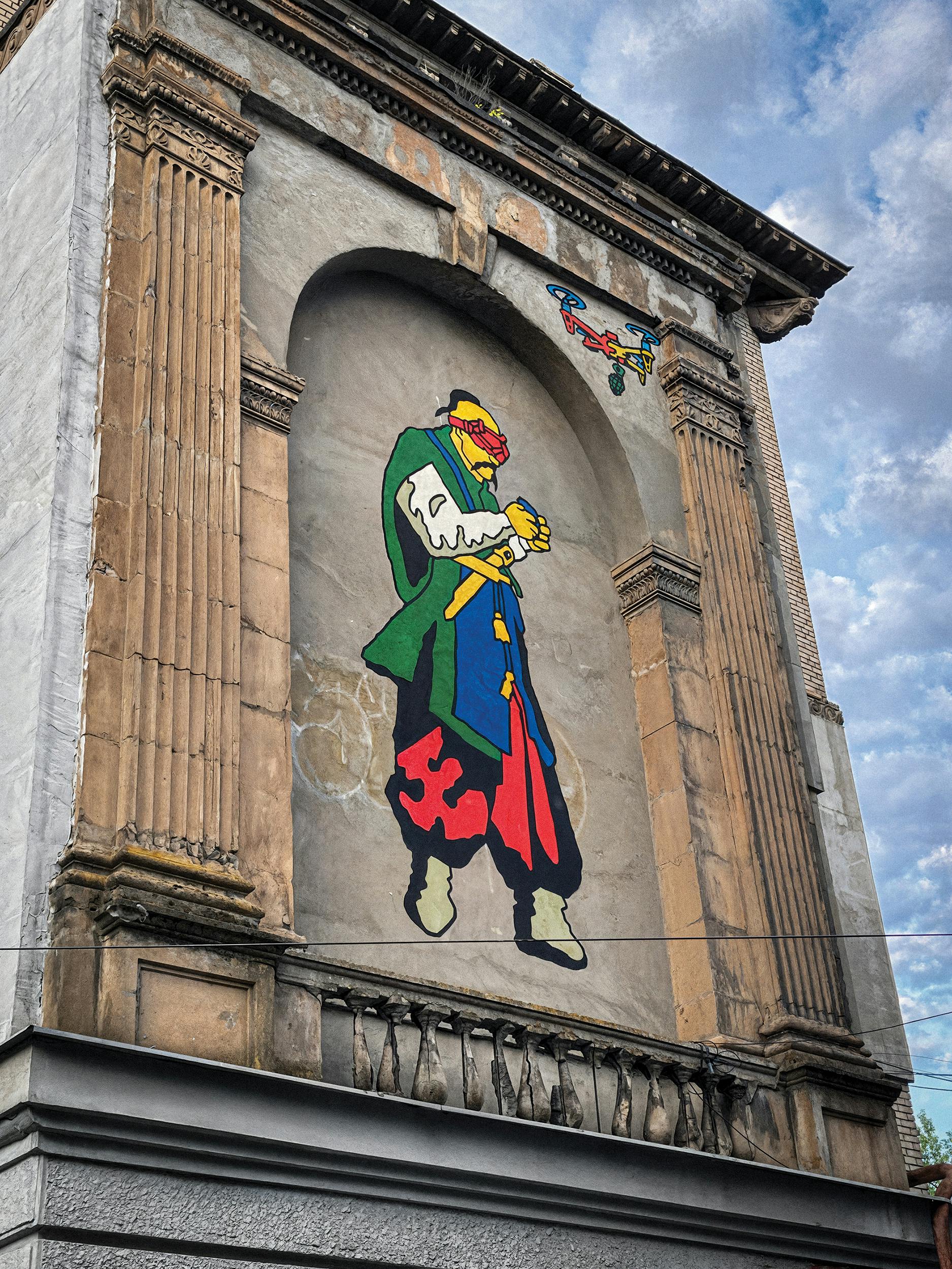 A photo of a mural in Zaporizhzhia, Ukraine, depicts a Cossack flying a drone.