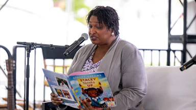 Stacey Abrams reading a children's book that she wrote