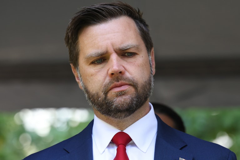J.D. Vance looks down while at a 9/11 memorial service