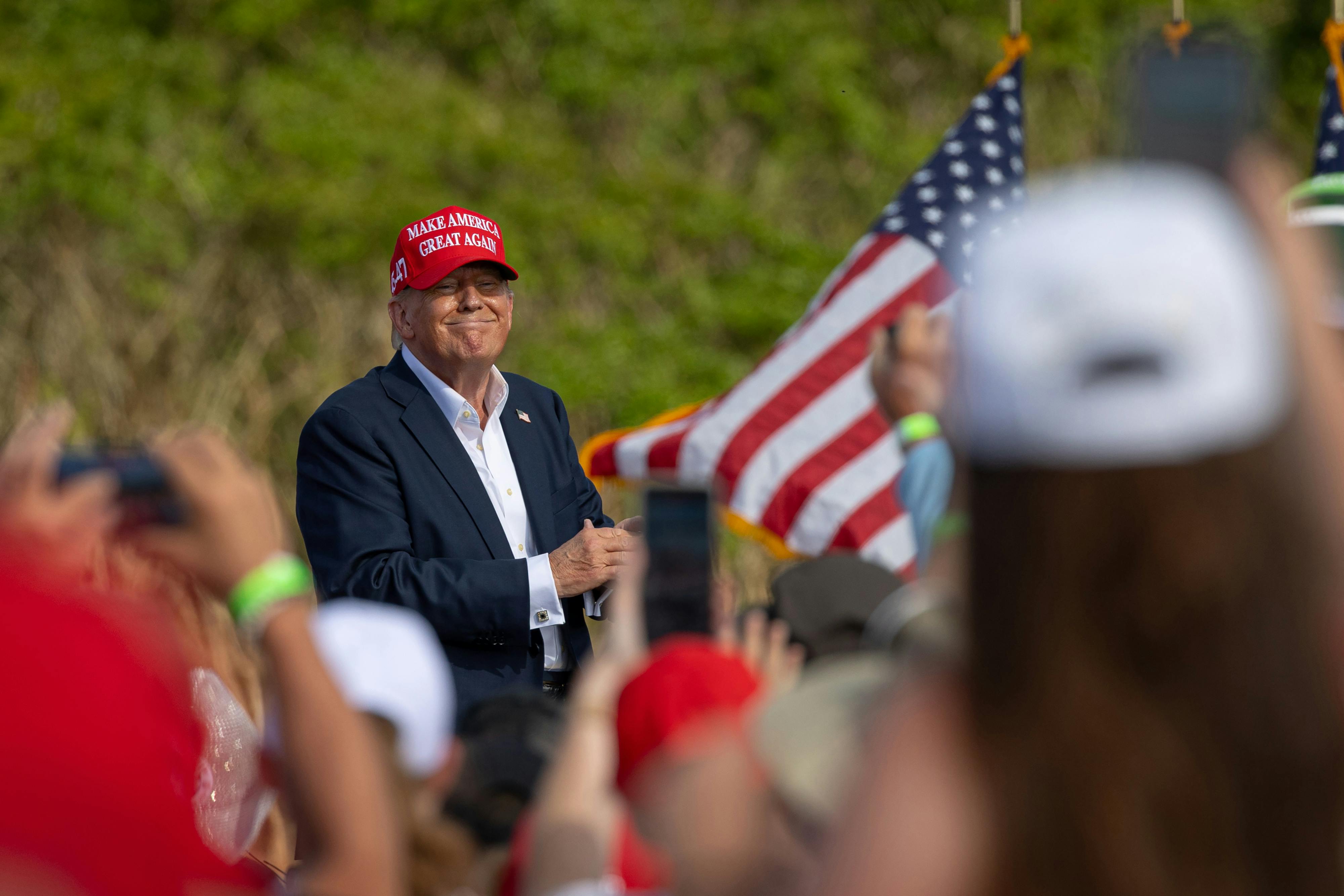 Donald Trump smiles at rally