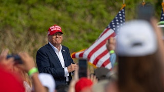 Donald Trump smiles at rally