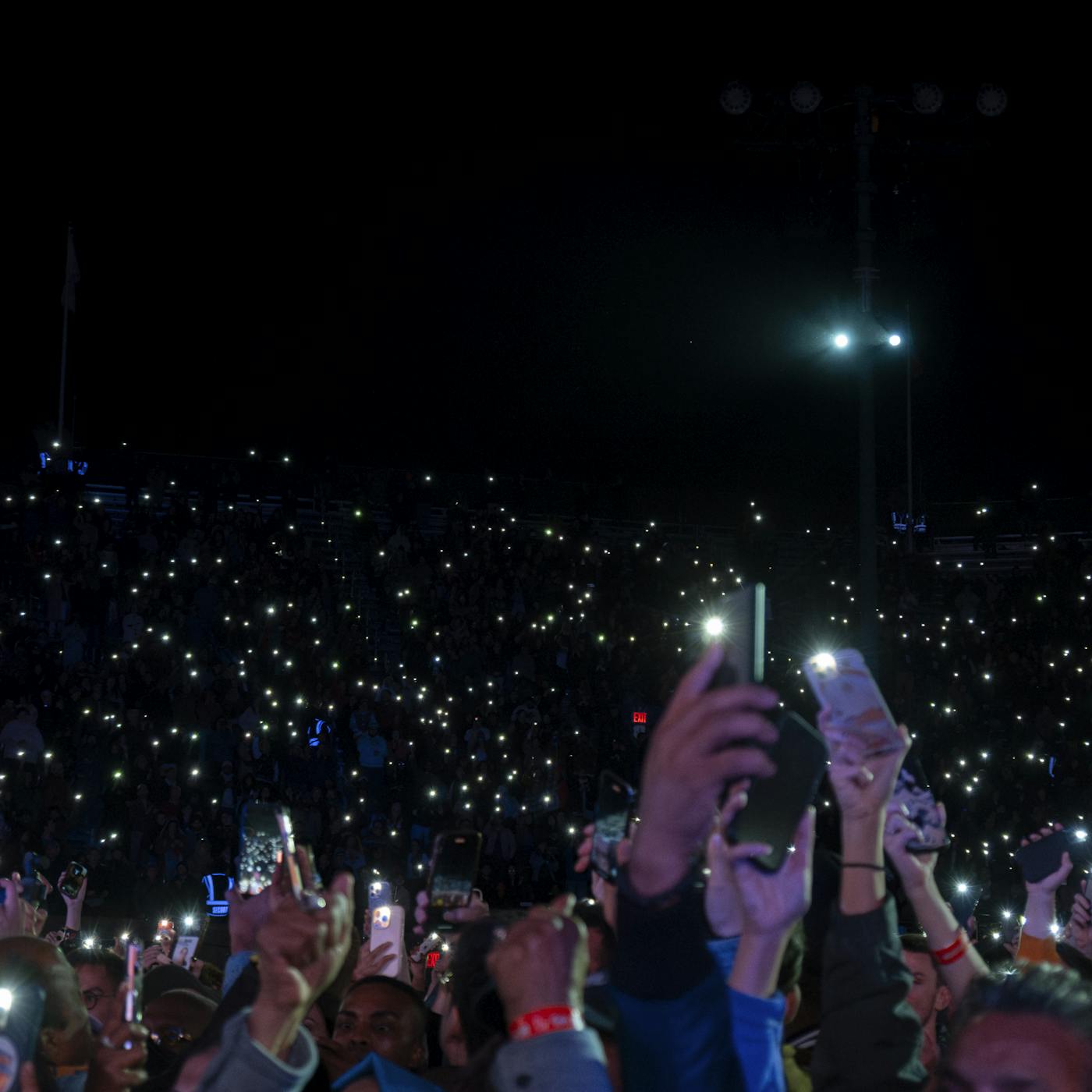 Thousands of supporters light up the Forest Hills Stadium in Queens with their phone lights during a Mamdani rally