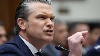 Defense Secretary Pete Hegseth gestures and speaks during a House committee hearing