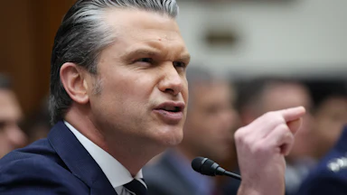 Defense Secretary Pete Hegseth gestures and speaks during a House committee hearing