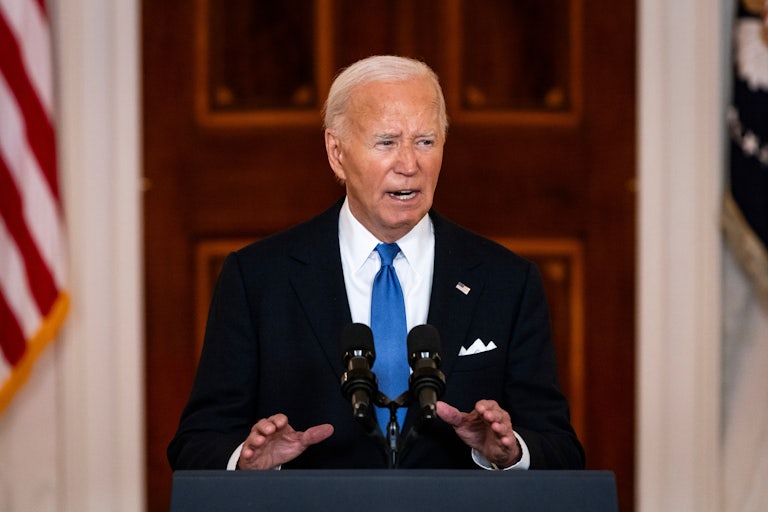 Joe Biden speaking at a podium
