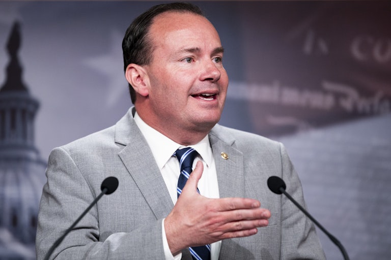 Senator Mike Lee speaks at a lectern.