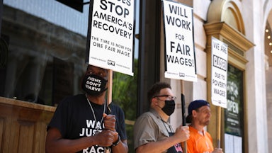 Activists with One Fair Wage participate in a “Wage Strike" demonstration outside of the Old Ebbitt Grill in Washington DC.