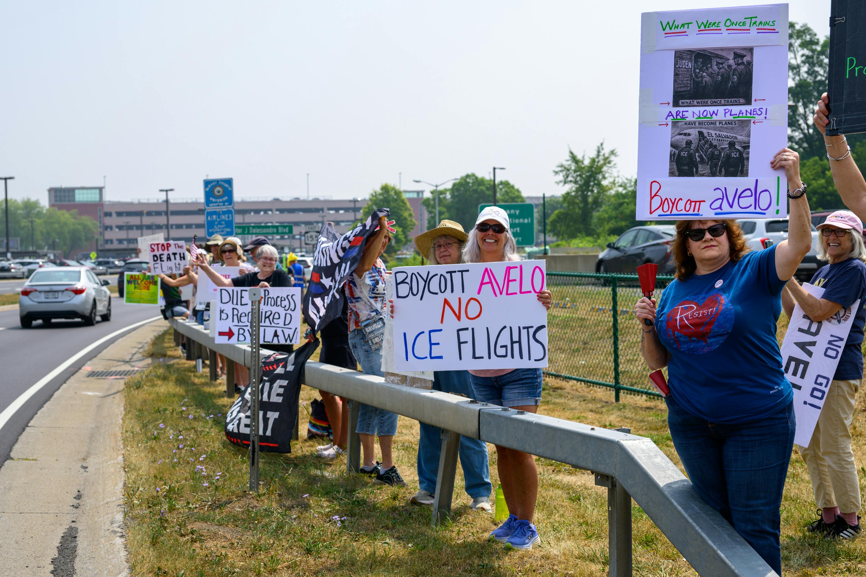 People protest against Avelo Airlines outside Albany International Airport in Albany, New York