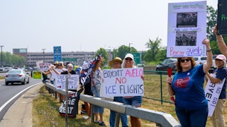People protest against Avelo Airlines outside Albany International Airport in Albany, New York