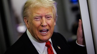 Trump speaks to reporters on plane