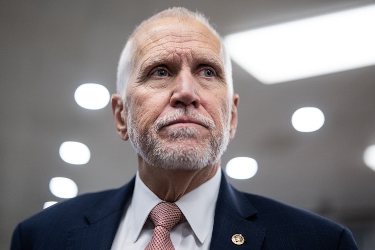 Senator Thom Tillis walks in the U.S. Capitol