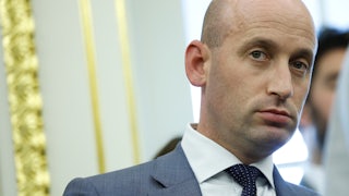 White House deputy Chief of Staff Stephen Miller stands