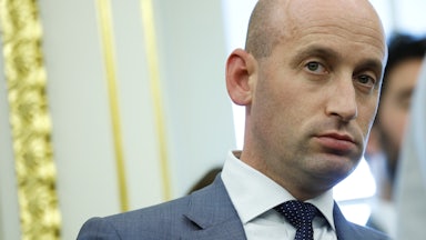 White House deputy Chief of Staff Stephen Miller stands