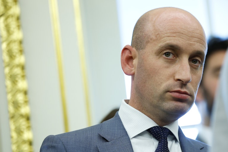 White House deputy Chief of Staff Stephen Miller stands