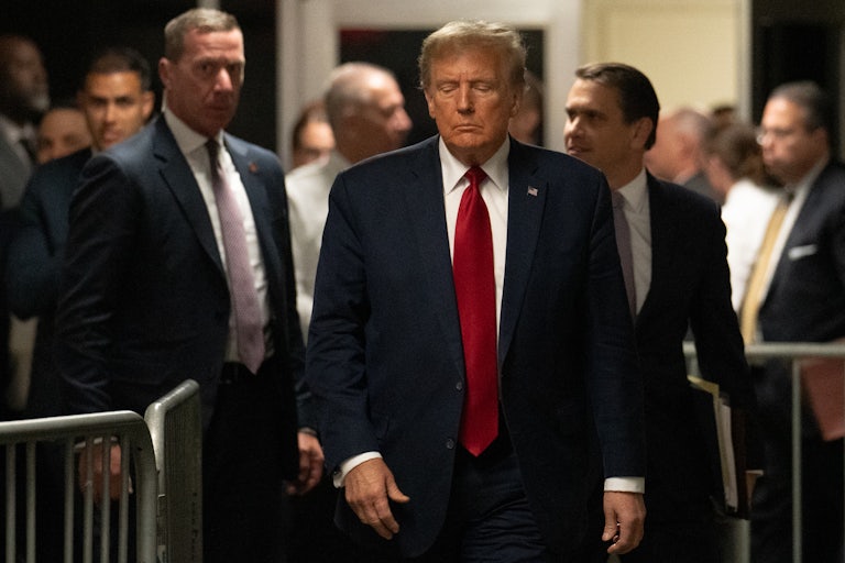 Donald Trump exits New York State Supreme Court on Thursday, Feb. 15, 2024.