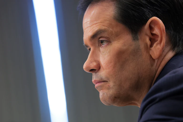 Secretary of State Marco Rubio sits in a Senate hearing