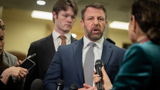 Senator Markwayne Mullin speaks to reporters.