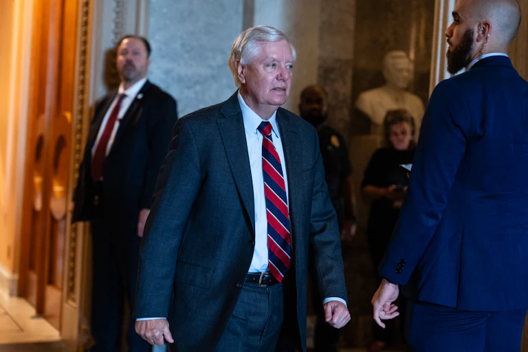Senator Lindsey Graham walks in the Capitol