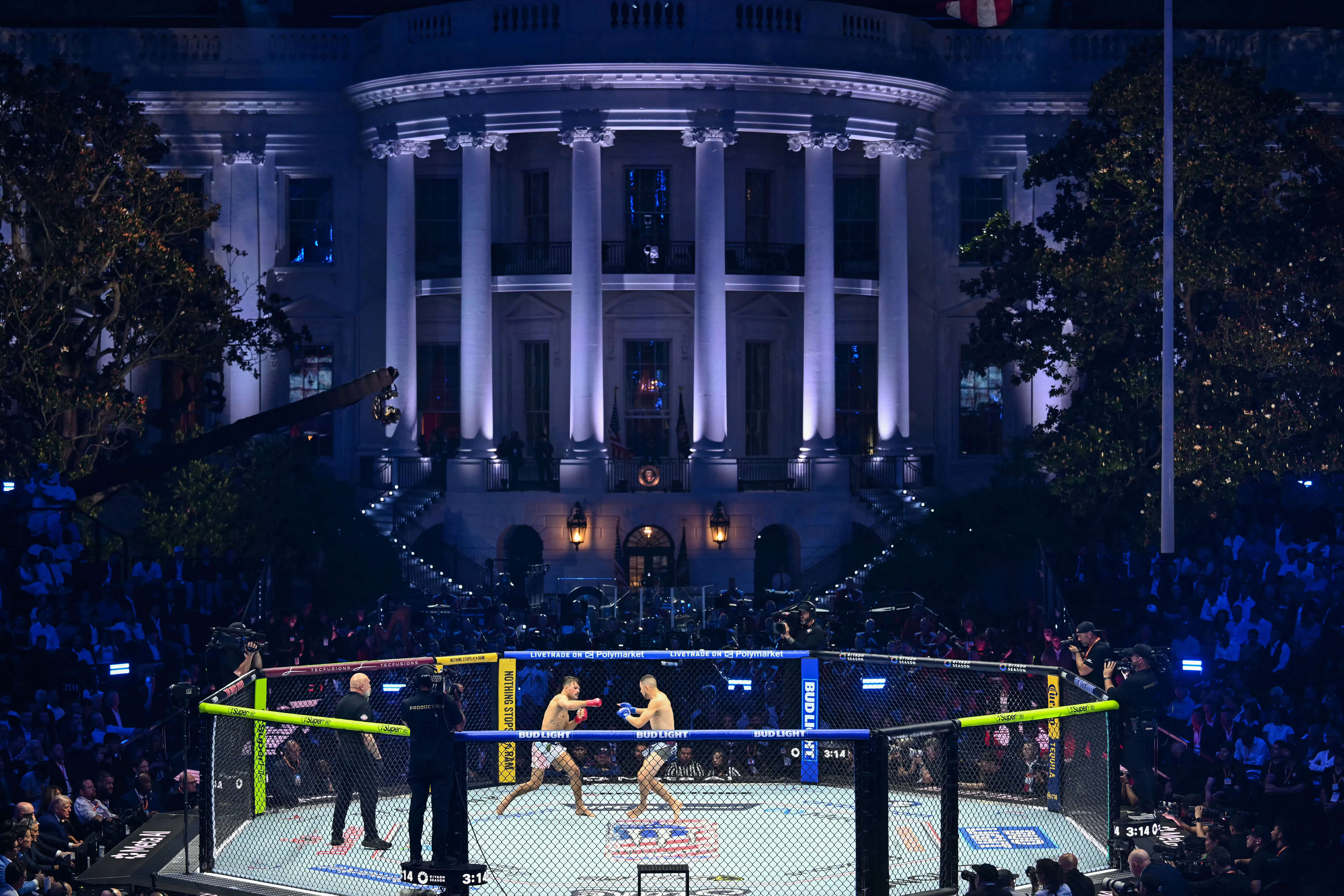 Two UFC fighters compete in a ring on the White House lawn