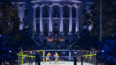 Two UFC fighters compete in a ring on the White House lawn