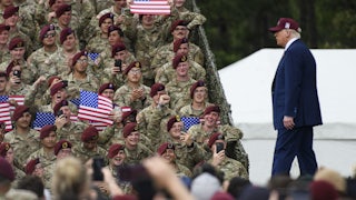 Soldiers react as U.S. President Donald Trump arrives on stage during a celebration to honor the 250th anniversary of the U.S. Army in Fort Bragg, North Carolina.