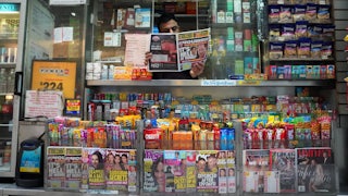 A newspaper salesperson in New York City