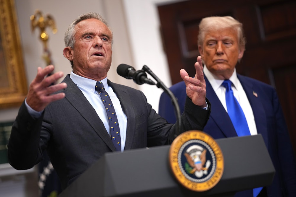 Robert F. Kennedy Jr. speaks alongside Donald Trump during a press conference in the Roosevelt Room of the White House.