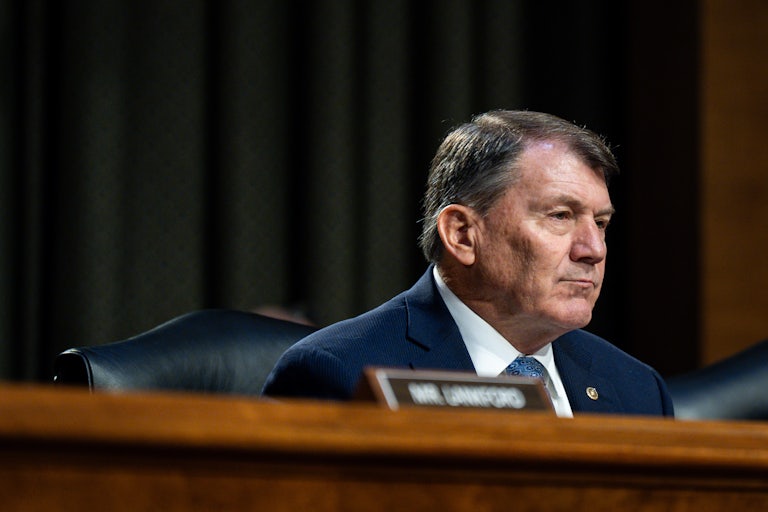 Senator Mike Rounds sits in a Senate hearing