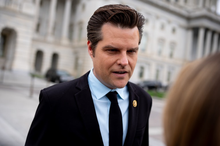 Matt Gaetz looks down