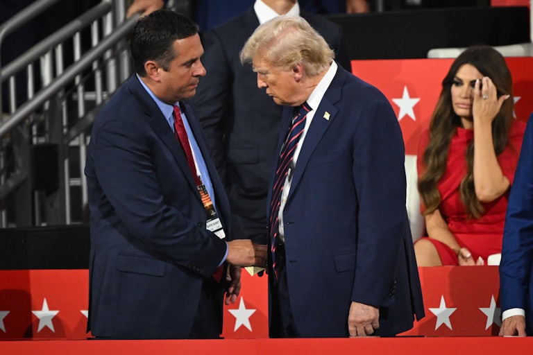 Devin Nunes shakes hands with Donald Trump at the 2024 RNC.