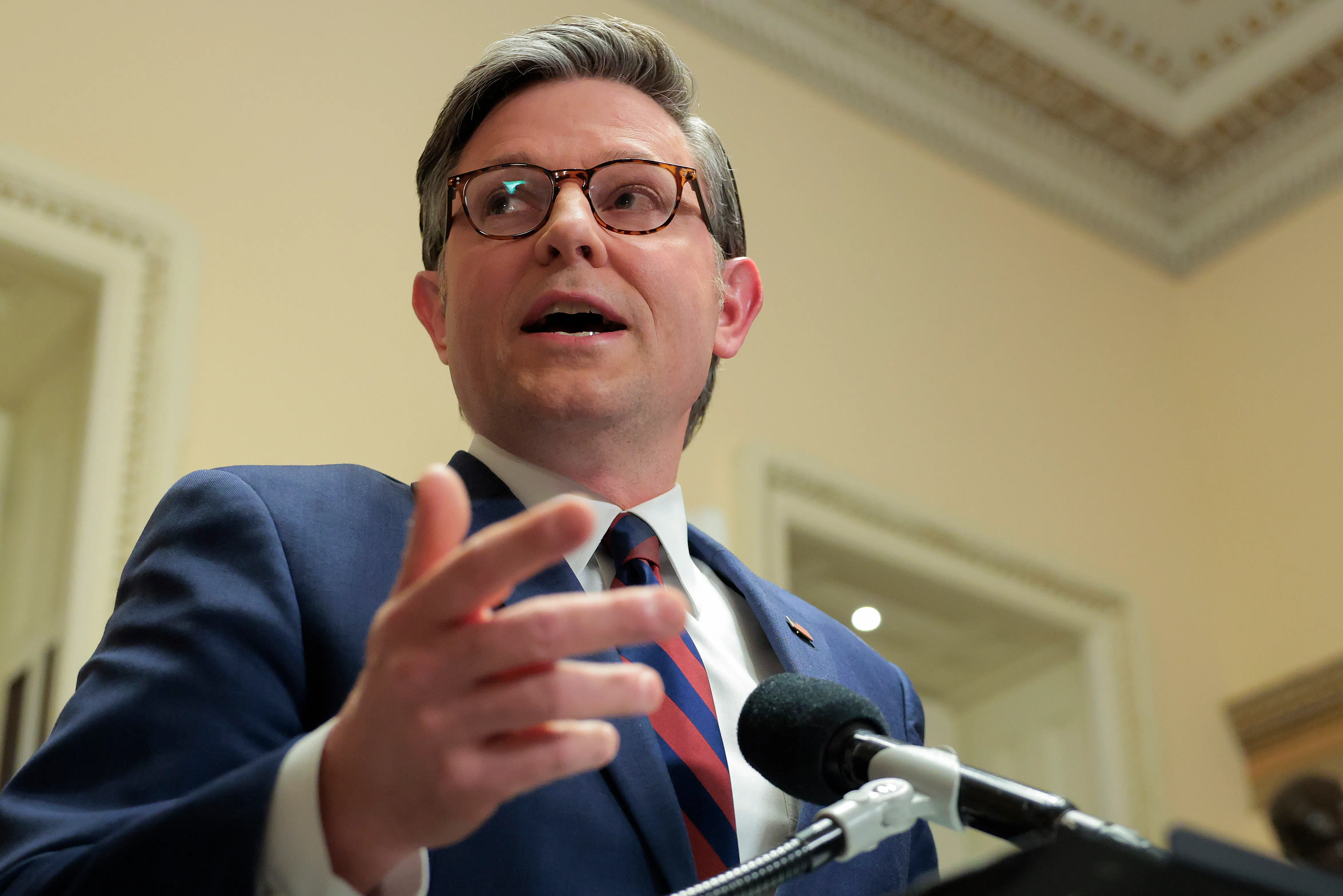 House Speaker Mike Johnson speaking to reporters in the Capitol