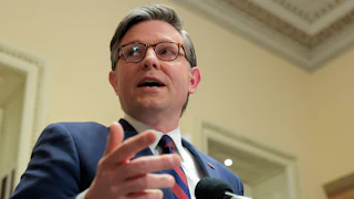 House Speaker Mike Johnson speaking to reporters in the Capitol
