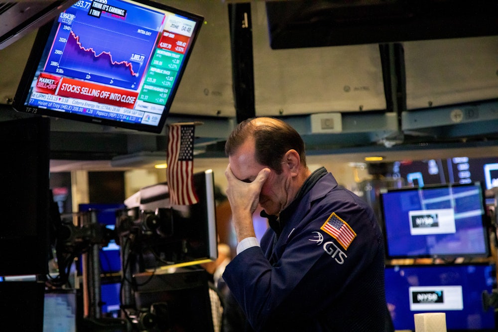 A trader on the floor of the New York Stock Exchange