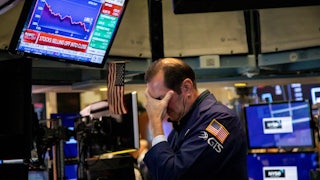 A trader on the floor of the New York Stock Exchange