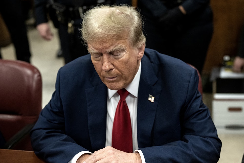 Trump with his eyes closed during his trial