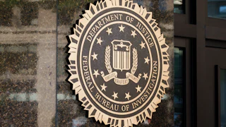 The FBI logo on the outside of its headquarters building in Washington, D.C.