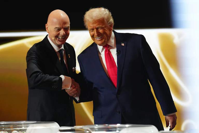 FIFA President Gianni Infantino shakes hands with U.S. President Donald Trump