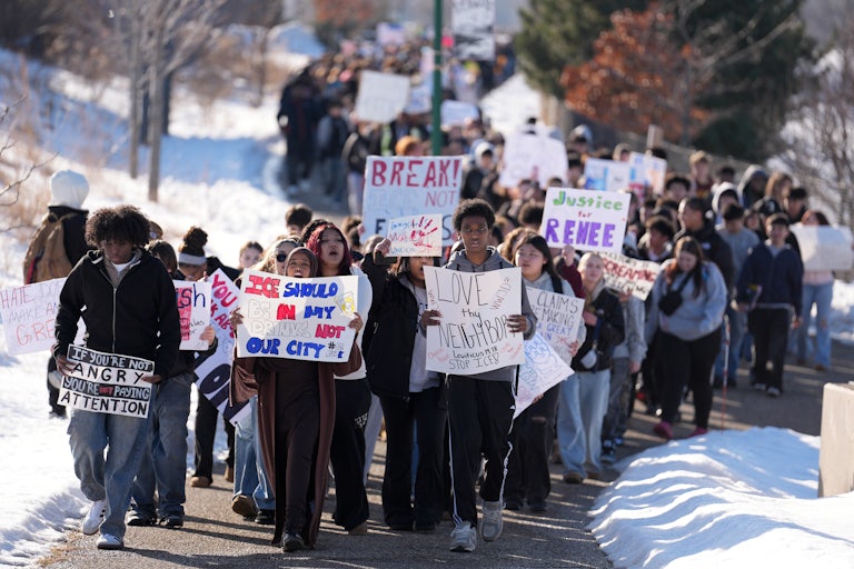 Students protest holding up signs like "Justice for Renee" and "ICE should be in my drinks not our city."