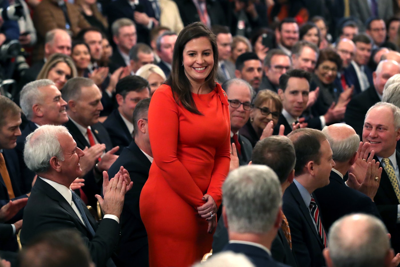 Elise Stefanik is applauded by her colleagues in Congress.