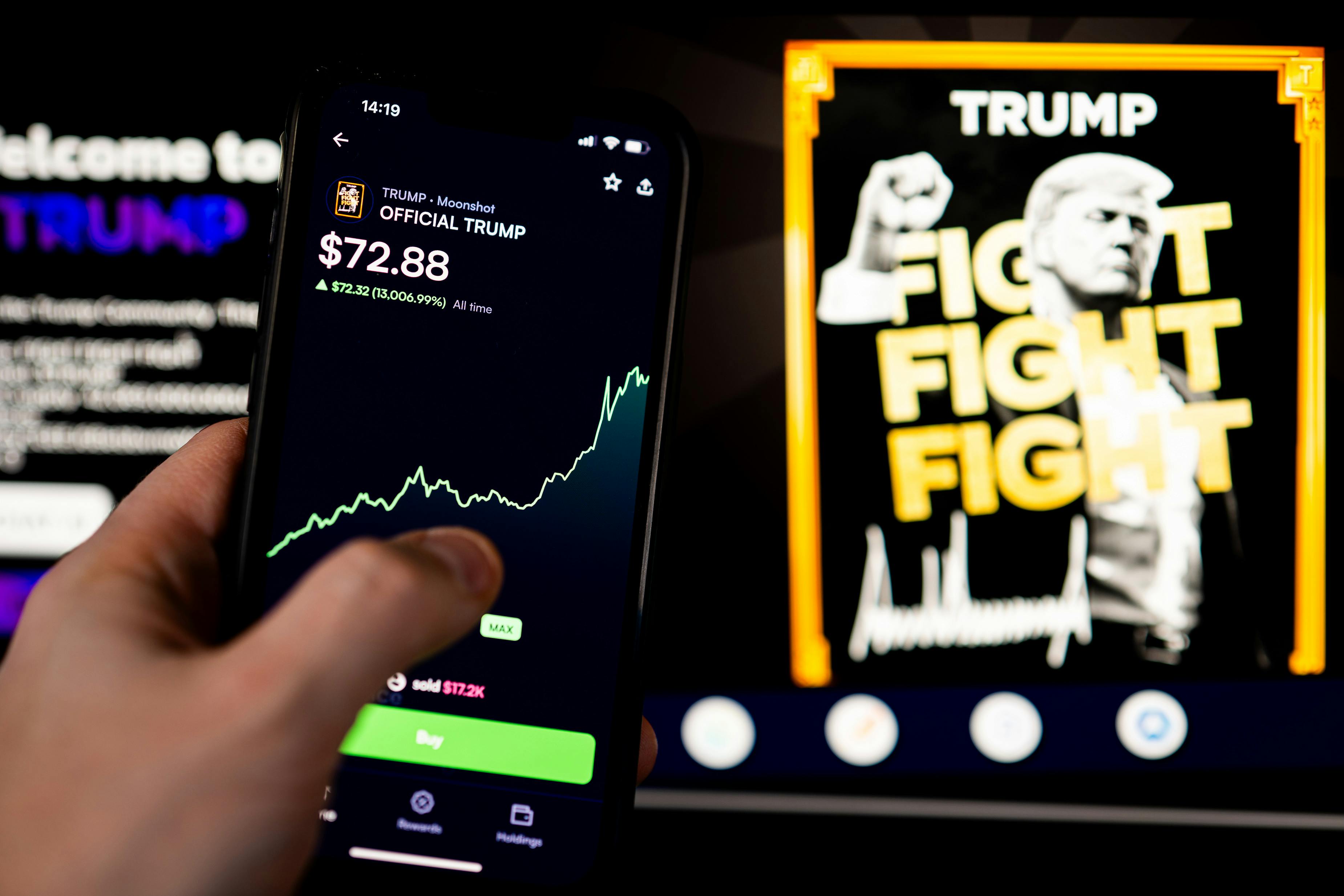 In this photo illustration, a Donald Trump meme coin $Trump logo seen displayed on a smartphone. 
